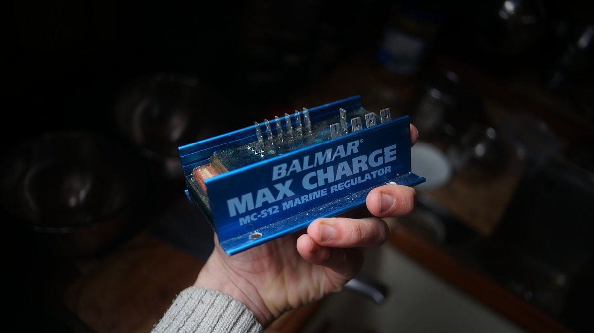 a photo of a hand holding a balmar regulator