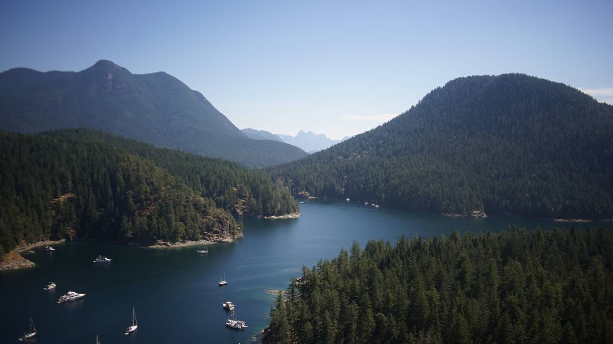 tenedos bay from the cliff lookout, with pino anchored in the bay below