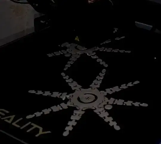 Photo of the first few layers of a printed model with edges curling up