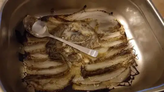 Baking pan with burnt melted plastic Baking pan with burnt melted plastic