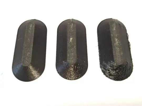 3 elongated conical test pieces - convex hull of two translations of a truncated cone with 8 mm diameter at bottom, rising 50°, turned upside down to show overhang print problems