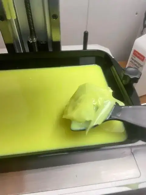 Photo of resin in a vat that has turned to sludge