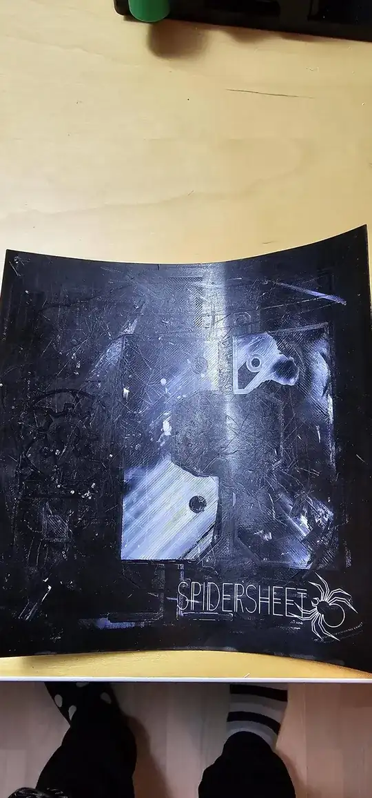 Photo of the old SpiderSheet over the buildplate