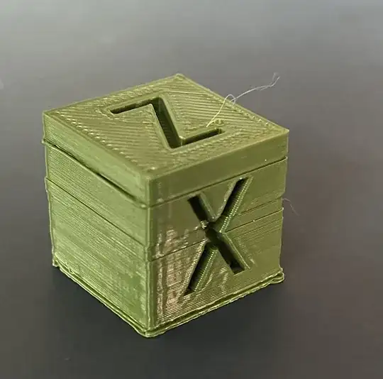 3D printed calibration cube with printing errors 3D printed calibration cube with printing errors