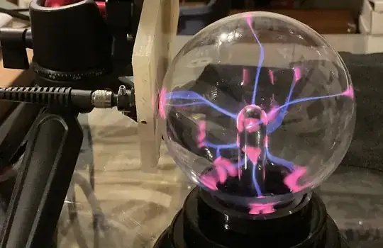 Plasma globe and fiber optic interface