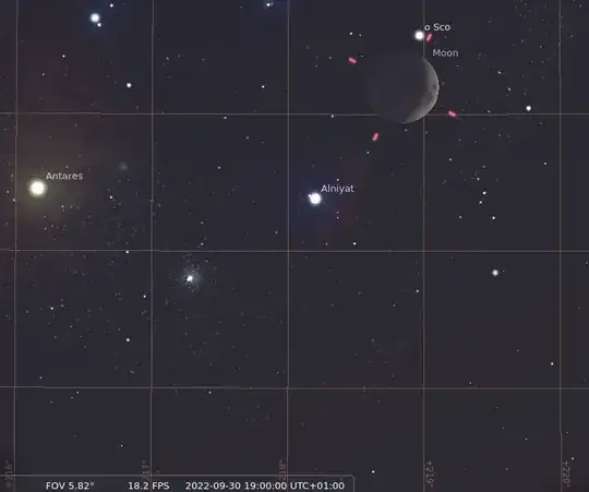 moon pointing to the right at sunset in september