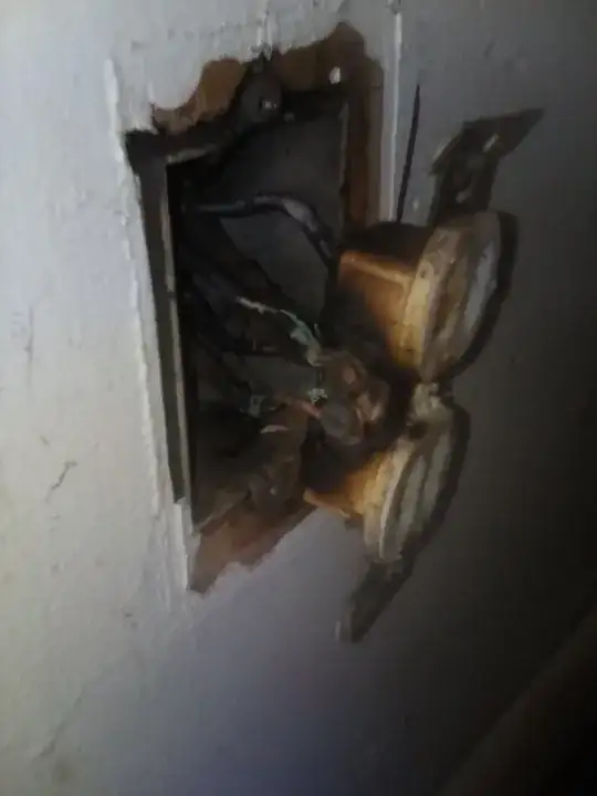 photo of burnt house mains outlet socket