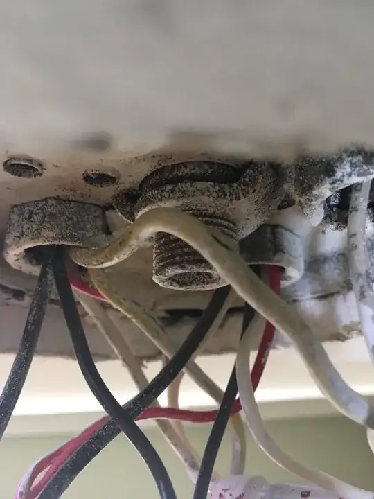 close up photo of existing old ceiling junction box in profile