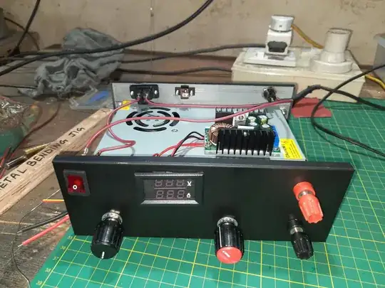 Picture shows the DC DC Buck converter module that I am using to make the PSU