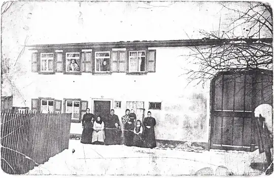 postcard front: photograph of the family