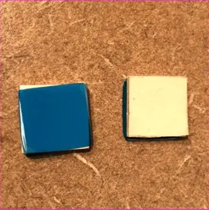 two square pads that came with laptop