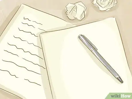 Image titled A written letter with older versions crumpled up.