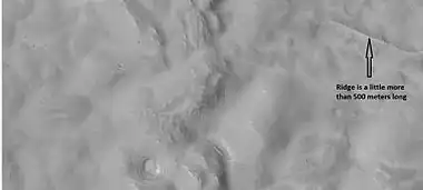 Ridge and surface features near rim of Adams crater, as seen by HiRISE under HiWish program