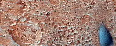 Close, color view of dunes as seen by HiRISE under HiWish program. Ripples are visible on dune surface.