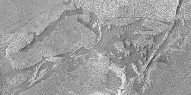 Close view of hollows, as seen by HiRISE under HiWish program.  Note: this is an enlargement of the previous image.