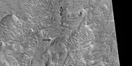 Ridges of different sizes, some indicated by arrows are straight.  Picture taken with HiRISE under HiWish program.