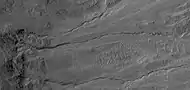 Close view of gullies, as seen by HiRISE under HiWish program. Curves in channels are evidence that these gullies were not created by landslides.