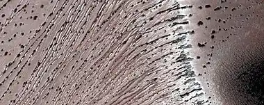 Close, color view of the end of gullies in Russell Crater, as seen by HiRISE