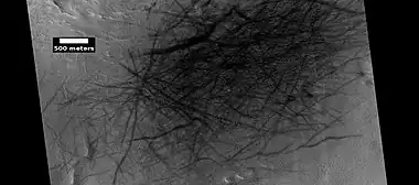 Dust devil tracks, as seen by HiRISE under HiWish program