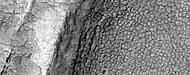 High-center polygons, as seen by HiRISE under HiWish program. Image is of the top of a debris apron in Deuteronilus Mensae.