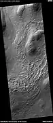 Wide view of hollows, as seen by HiRISE under HiWish program.  Hollows may be formed as ice leaves the ground.