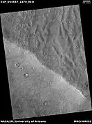 Channels that may have been made by the backwash of tsunamis in an ocean.  Image is from HiRISE under the HiWish program.