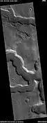 Example of frettered terrain, as seen by HiRISE under HiWish program.  Fretted terrain contains many wide, flat-floored valleys.