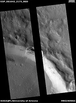 Type of landslide called a slump  along crater wall, as seen by HiRISE under HiWish program  Black strip is due to data not collected there.