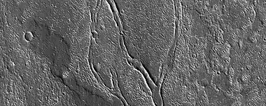 Close view of lava channels,  as seen by HiRISE under HiWish program  As the lava cools it forms levels on its sides because the lava on the edge cools (and hardens) faster.