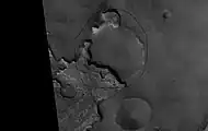 Exhumed Crater in Mare Acidalium, as seen by Mars Global Surveyor