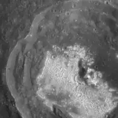 The hollows in the floor of Hopper are as bright as Kuiper crater