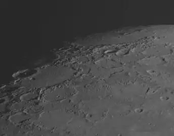 Oblique view of Mendelssohn and Kofi craters from MESSENGER's first flyby in January 2008