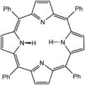 Tetraphenylporphyrin (H2TPP)is another synthetic analogue of protoporphyrin IX. Unlike the natural porphyrin ligands, TPP2− is highly symmetrical. Another difference is that its methyne centers are occupied by phenyl groups.