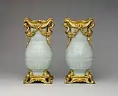 Pair of Chinese vases with French Rococo mounts; the vases: early 18th century, the mounts: 1760–70; hard-paste porcelain with gilt-bronze mounts; 32.4 x 16.5 x 12.4&nbsp;cm; Metropolitan Museum of Art