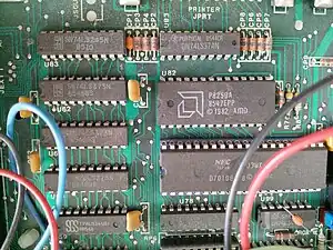 Mainboard. An AMD P8259A Programmable Interrupt Controller is visible, together with a NEC V20 (μPD70108) main processor (instead of an Intel 8088)